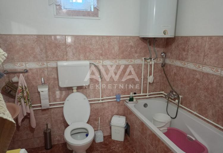 Sonta. Prizemna kuća 100m² na placu od 45,8 ari sa pomoćnim stanom